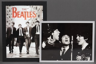 A 3-dimensional photograph of The Beatles walking 30cm x 28cm and a reproduction black and white photograph of the Beatles singing 29cm x 38cm 