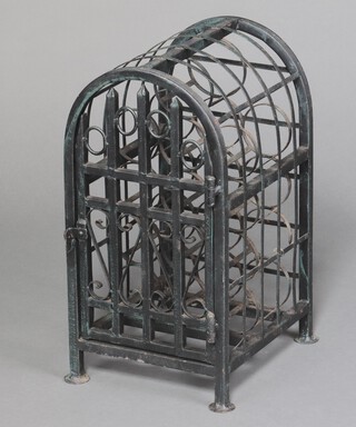 An arch shaped pressed metal 13 bottle wine rack 56cm h x 33cm w x 37cm d  