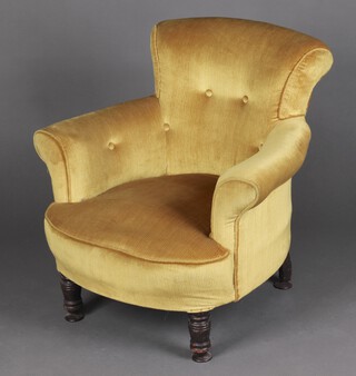 A Victorian tub back chair upholstered in mustard coloured material 