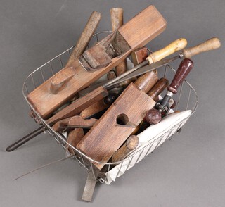 A wooden hand drill, a wooden jack plane and a quantity of other tools 