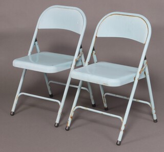 A mid-century pair of Habitat Macadam turquoise pressed metal folding chairs (some rust in places) 