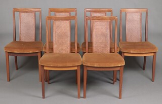 G-Plan, a mid-century set of 6 high back dining chairs with woven cane panels to the backs and upholstered seats