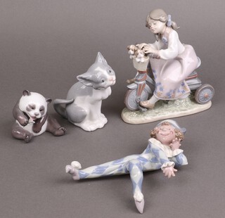Four Lladro figures -  5680 Travelling in Style 7cm, Feed Me 5cm,  38355 Cheerful Panda 9cm and Neglected Harlequin Clown 1503 18cm 