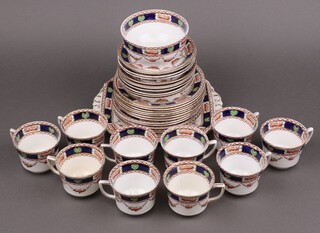 A Royal Crown Derby style tea service comprising twin handled plate, tea plates, sugar bowl, tea cups and  saucers (some pieces ring flat, contact marks in places) 