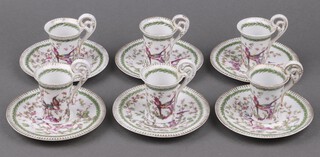 A 12 piece Meissen style coffee set decorated birds within a garland comprising 6 cups (1 rings flat) and six saucers, the base with crossed sword mark 