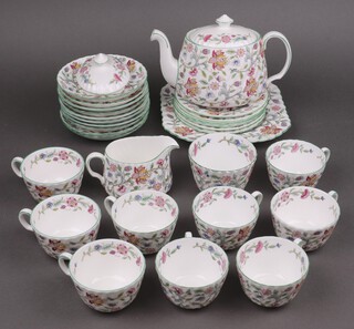 A 29 piece Minton Haddon Hall tea service comprising teapot, milk jug and sugar bowl, square plate, 6 tea plates, 9 cups, 10 saucers (1 rings flat), spare teapot lid 