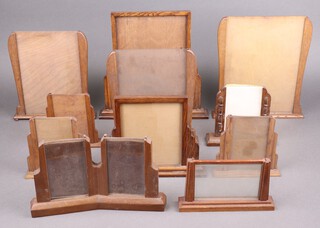 Eleven 1930's Art Deco oak and glass photograph frames