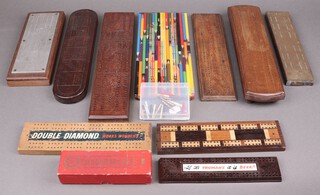 A collection of wooden cribbage boards 