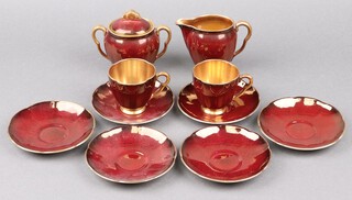 A 10 piece Carlton Ware Rouge Royal pattern coffee set comprising twin handled sugar bowl, cream jug, 2 cups and 6 saucers (all saucers ring flat)