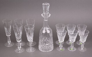 A set of 6 Waterford Crystal Kenmare pattern white wine glasses, boxed, a Waterford Crystal club shaped decanter and stopper and 6 (1 matched) champagne flutes 