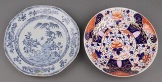 An early 19th Century Chinese blue and white plate decorated a tree 23cm, together with an Imari style dish 22cm (all a/f) 