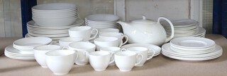 A 67 piece Wedgwood Solar Shape 225 dinner/tea service comprising 8 large dinner plates, 7 bowls, 4 tea plates, 9 bowls, 3 small tea plates, 4 tiny tea plates, 4 saucers all unmarked, 3 Wedgwood shape 225 tea cups and 5 other unmarked tea cups, ditto teapot, 3 small saucers (1 marked Wedgwood), 4 coffee cans (2 marked), 4 plates, 7 plates (bases marked Wedgwood), 4 Wedgwood Night and Day pattern shade side plates and 5 other Night and Day pattern plates (some pieces with contact marks)  