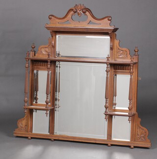 A Victorian 6 plate over mantel mirror contained in a carved oak frame with fluted columns to the sides 120cm x 127cm x 16cm (1 finial a/f) 
