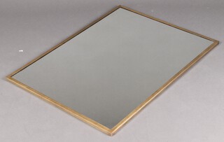 A mirror contained in a decorative gilt frame 102cm x 75cm 