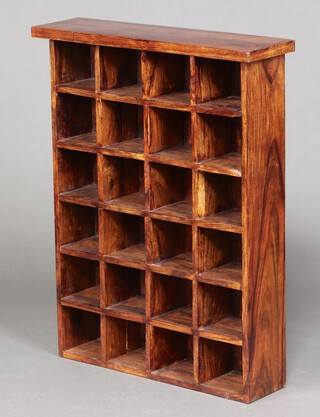 A hardwood range of 24 pigeon holes 92cm h x 72cm w x 20cm d 