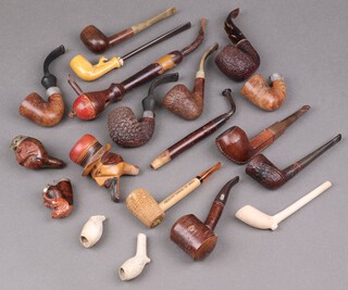 A clay pipe and other pipes