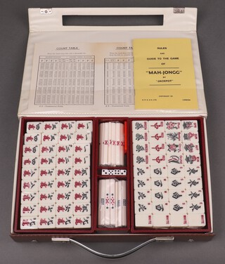 A plastic cased Mahjong set (as new) 