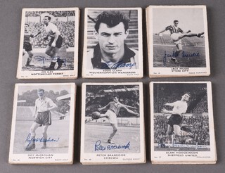A collection of 1960's trade football cards, each with a monochrome photograph and facsimile signature 