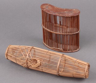 An early 20th Century kidney shaped cricket cage 13cm x 11cm together with a woven cane fish trap 24cm x 3cm 