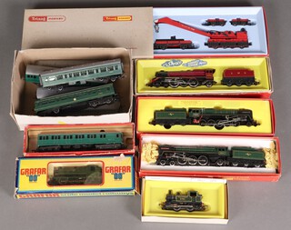 A Triang Dublo locomotive and tender R258 boxed, 1 other R361, R552 Oliver Cromwell boxed, Triang R355B tank engine boxed, Triang R739 Breakdown Crane Set, R156 Southern Railway Suburban Motor Coach, a Graffa GWR tank engine boxed, etc, all contained in a plastic box 