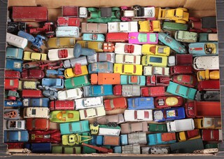 A collection of Lesney and Matchbox model cars, all play worn, contained in a fruit box