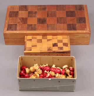A turned wooden chess set and 1 other turned and painted Eastern chess set together with 2 folding chess boards 