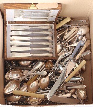 A set of 6 silver plated fish knives and forks contained in an oak canteen box and a collection of silver plated flatware 