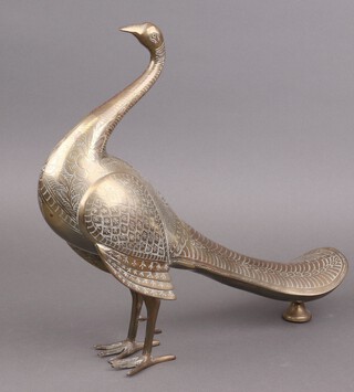 A Benares brass figure of a standing peacock 43cm 