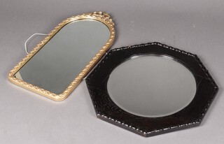 An arched plate mirror contained in a decorative gilt frame with swag decoration 70cm h x 35cm together with a circular bevelled plate mirror contained in an octagonal ebonised oak frame 61cm 