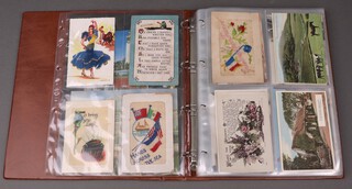 An album of black and white and coloured postcards 