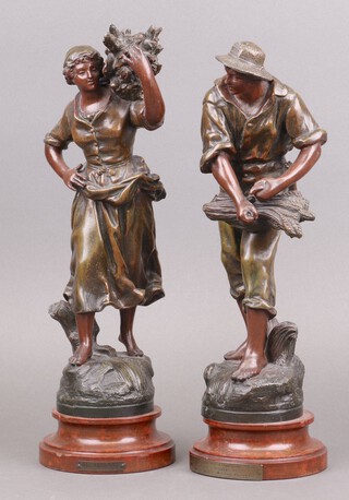 A pair of spelter figures depicting The Harvest, on turned wooden bases 40cm 