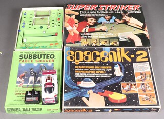 A Subbuteo Continental Club Edition Football Game boxed, Super Striker Football Game boxed,  a Spacenik-2 battery powered space vehicle boxed and a Shinsei radio controlled car
