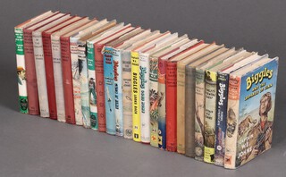 Johns W. E., a collection of 23 Biggles books  and one Gimlet's Oriental Quest (some with dust covers)