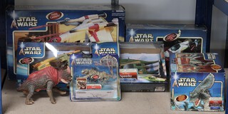 Star Wars Attack of the Clones, a collection of playsets and vehicles to include Republic Gunship, Anakin Skywalker Speeder, Zam Wesell's Speeder, Nexu, Acklay, OB-Wan Kinobis Jedi Starfighter and Reek, all boxed apart from Reek (not guaranteed complete)