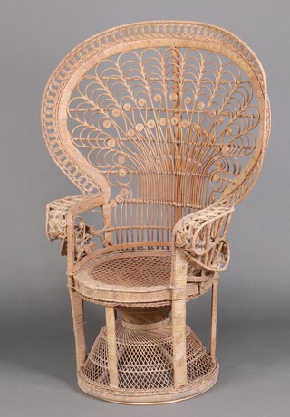 A wicker peacock chair 139cm h x 70cm w 