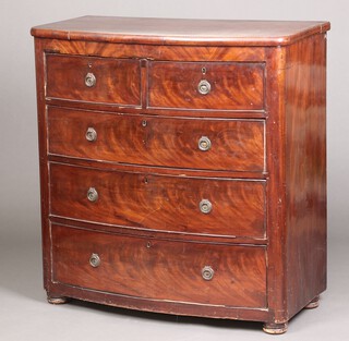 A Victorian mahogany bow front chest of 2 short and 3 long drawers with replacement ring drop handles 112cm h x 107cm w x 51cm d 