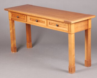 A rectangular hardwood side table fitted 3 drawers, raised on square supports 75cm h x 150cm w x 50cm d 