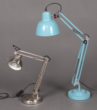 A blue Anglepoise style lamp together with a similar lamp