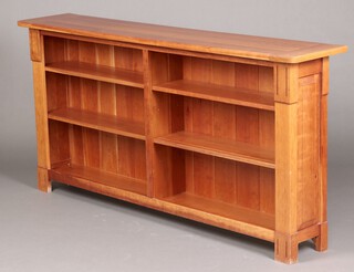 A hardwood open bookcase fitted adjustable shelves 90cm h x 182cm w x 35cm d 