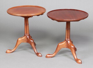 A pair of Georgian style circular mahogany wine tables on pillar and tripod supports 56cm h x 50cm diam. 