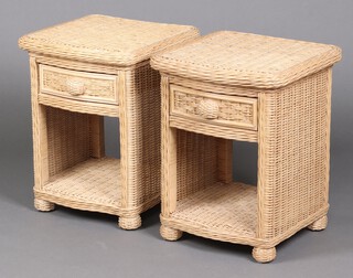 A pair of of rattan bedside tables fitted a drawer above recess 59cm h x 48cm w x 48cm d