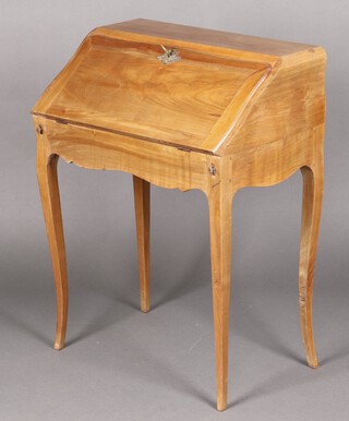 A 20th Century French bleached walnut bonheur du jour, the fall front revealing a well fitted interior and well, raised on cabriole supports 90cm h x 70cm w x 41cm d 
