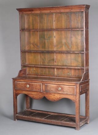 An 18th Century style oak dresser, the raised back with moulded cornice fitted 3 shelves, the base with shaped apron fitted 2 drawers above pot board 194cm h x 127cm w x 42cm d  