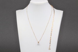 A gold marked 9ct chain 40cm with diamond set pendant 2.8g, together with a 9ct two colour gold bracelet 19cm, 1.4g