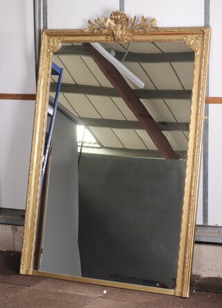 A 19th Century rectangular gilt over mantel mirror frame, containing a later plate mirror surmounted by garland and sprig 182cm h x 122cm w 