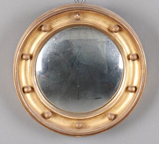 A 19th Century style circular wall mirror contained in a gilt ball studded frame 28cm 