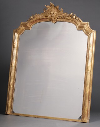 A 19th Century arched plate over mantel mirror contained in a plaster and carved hardwood frame 163cm h x 132cm w 