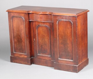 A Victorian mahogany serpentine fronted chiffonier fitted a drawer above cupboard, flanked by cupboards, 1 fitted a cellarette drawer  84cm high x 122cm w x 42cm d 