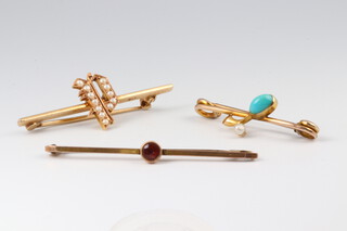 A 9ct gold bar brooch set a circular amber coloured stone, a 9ct gold bar brooch in the form of a pea set demi-pearls, 3.5g gross, together with a gilt metal bar brooch 