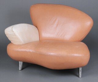 Poltromec, a hayloft style lounge chair, upholstered in 2 tone leather 